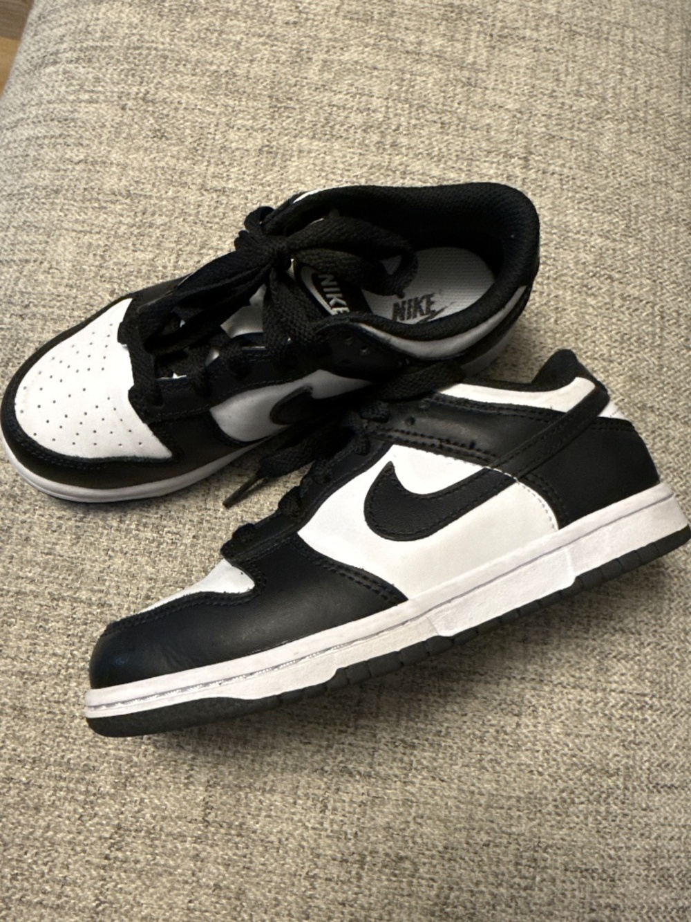 Kids Nike panda sneakers